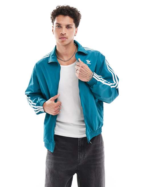 adidas Originals Adicolor Firebird Trainingsoberteil in Blau ASOS