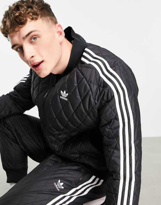 adidas Originals – adicolor drei Gesteppte | Schwarz Streifen – Trainingsjacke mit in ASOS