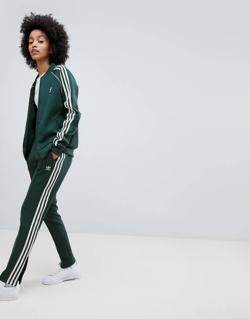 positie is genoeg Geneeskunde adidas Originals - adicolor - Groene broek met drie strepen | ASOS