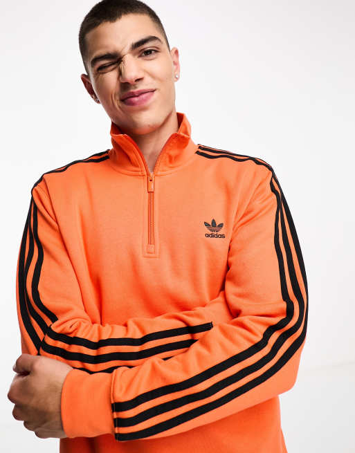 adidas Originals adicolor half zip sweatshirt in orange | ASOS