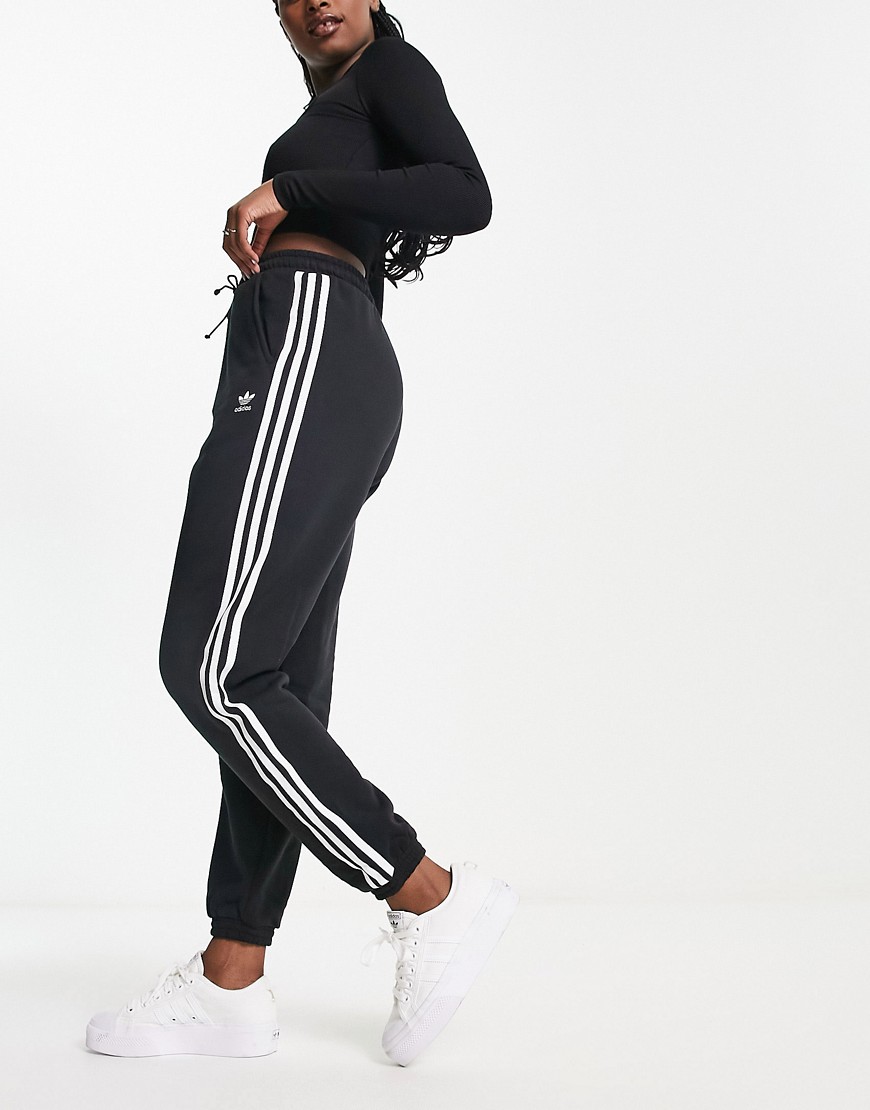 adidas originals -  – adicolor – Jogginghose mit engen Bündchen und drei Streifen in Schwarz