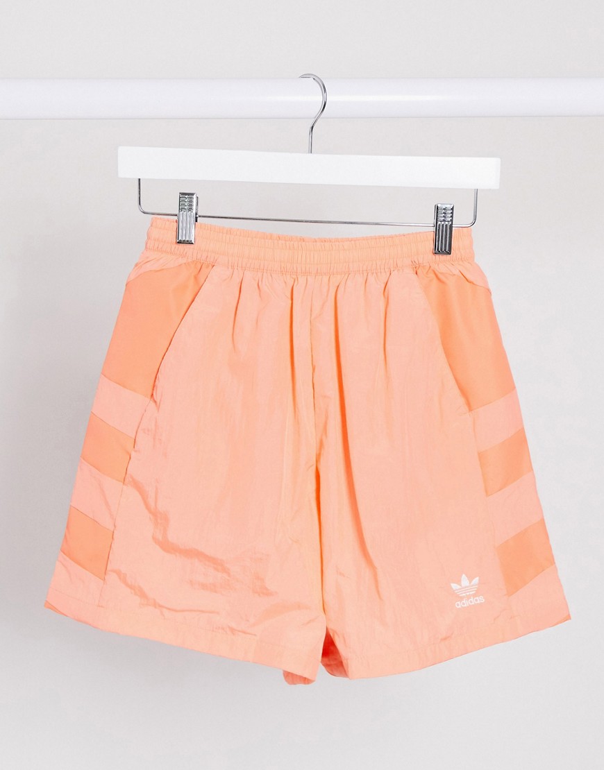 Adidas Originals adicolor large logo shorts in coral-Pink