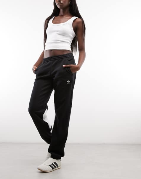 adidas Originals adicolor large logo track pants in black