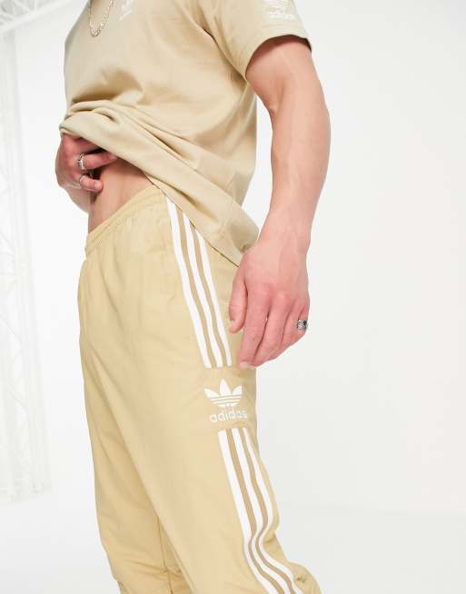 Jogging beige adidas sales