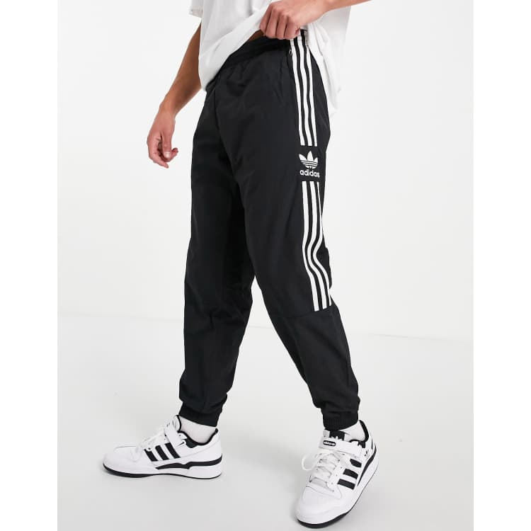 adidas Originals adicolor lock up joggers in black ASOS