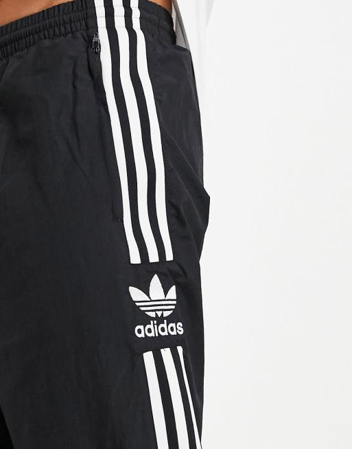 Adidas originals adicolor locked up logo track pants hot sale