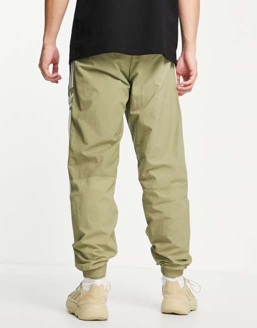 adidas Originals adicolor lock up joggers in khaki