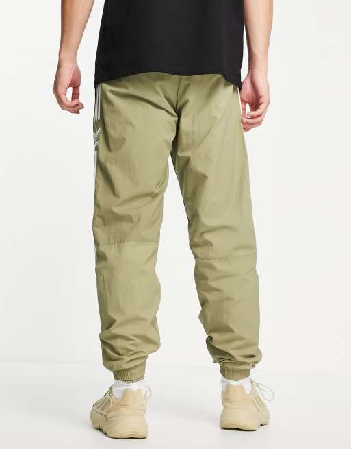 adidas Originals adicolor Locked Up logo leggings in khaki