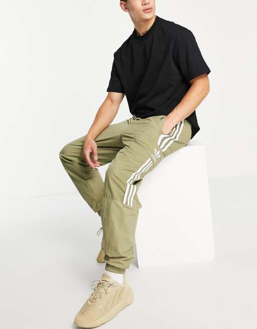 adidas Originals adicolor Locked Up logo leggings in khaki