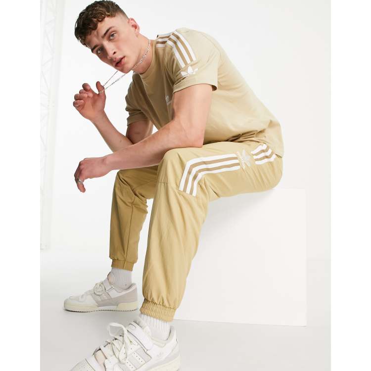 Adidas originals adicolor superstar track pants yellow top