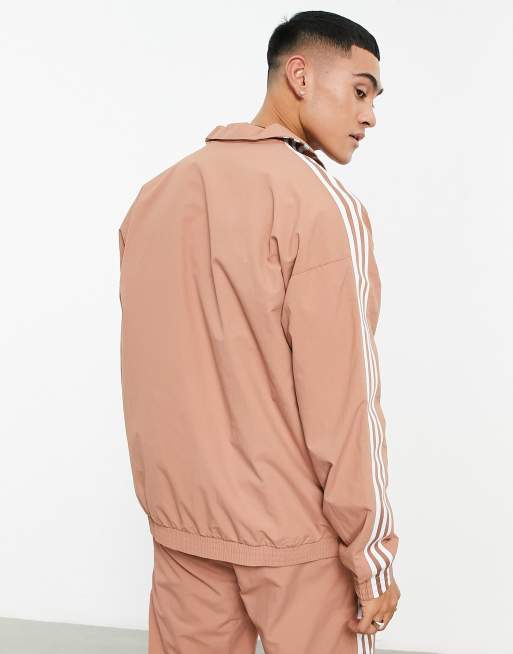 adidas Originals adicolor Lock Up Trainingstop in oranje ASOS