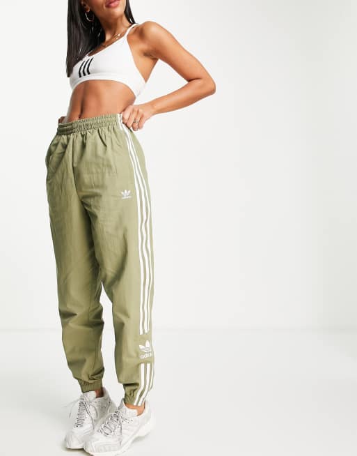 Originals adicolor Locked Up logo sweatpants in khaki ASOS