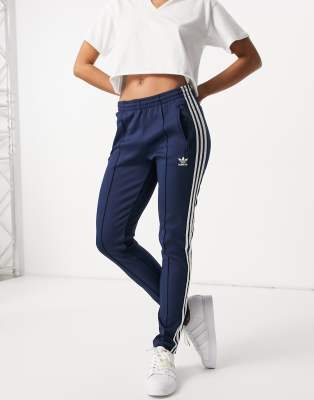 adidas originals joggers in blue with 3 stripe branding