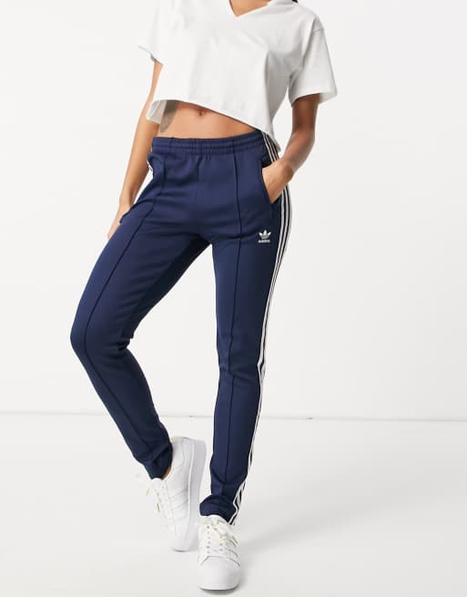 adidas Originals adicolor logo three stripe track pants in navy