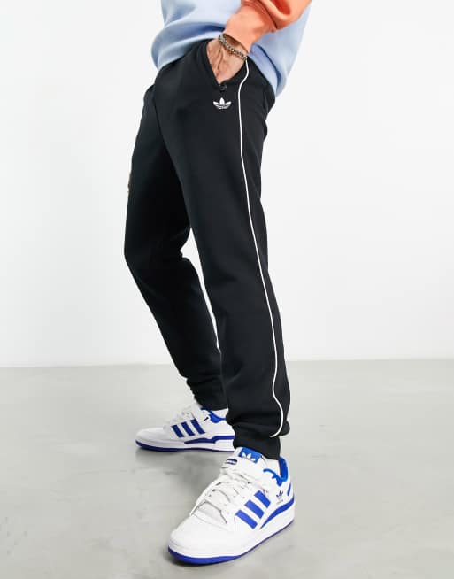 adidas Originals adicolor Next trackies in black | ASOS