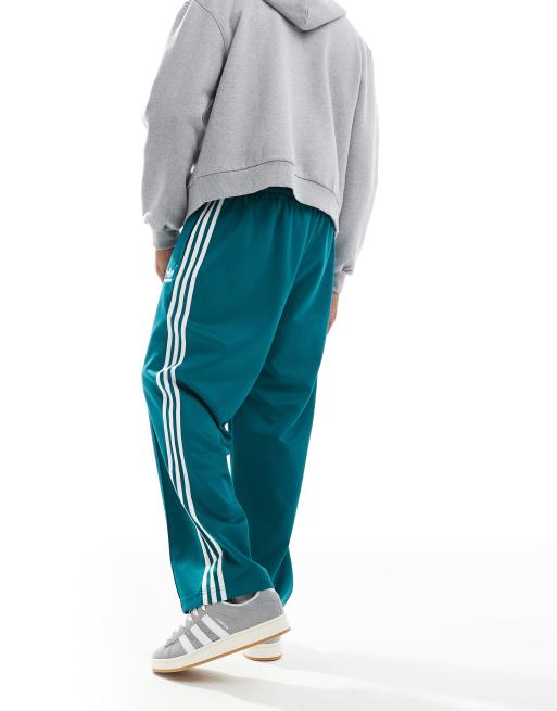adidas Originals Adicolor oversized tracksuit bottoms in teal