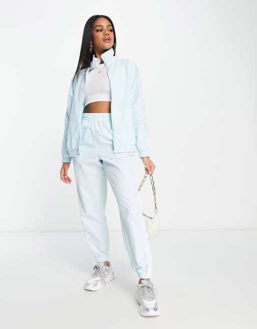 Pantalon adidas bleu clair 2025