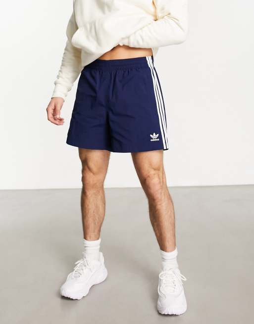 adidas Originals - adicolor - Pantaloncini da bagno blu navy con 3 strisce 