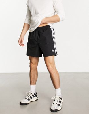 adidas Originals adicolor polyester 3 stripe shorter shorts in black  - ASOS Price Checker