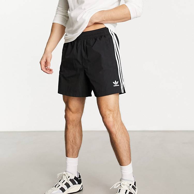 adidas Originals adicolor polyester 3 stripe shorter shorts in black | ASOS