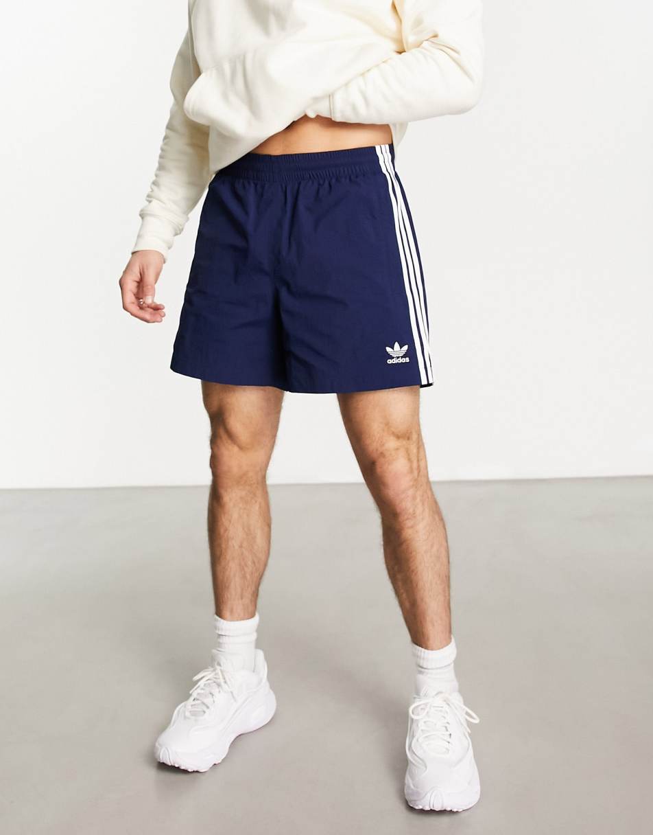 adidas Originals adicolor polyester 3 stripe shorter shorts in navy