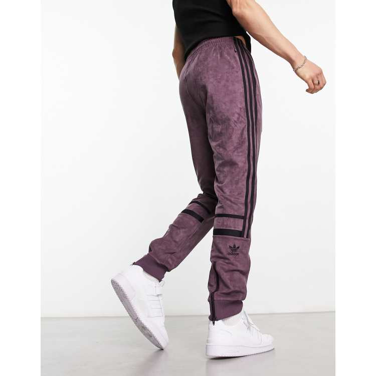 adidas Originals adicolor three stripe faux suede flared track pants in  maroon