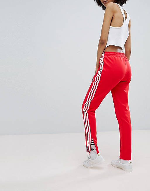 Gehoorzaam Tact uniek adidas Originals - adicolor - Rode broek met drie strepen | ASOS