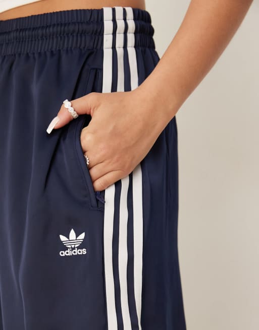 adidas Originals Adicolor satin wide leg track pants in navy