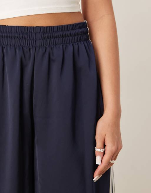 adidas Originals Adicolor satin wide leg track pants in navy
