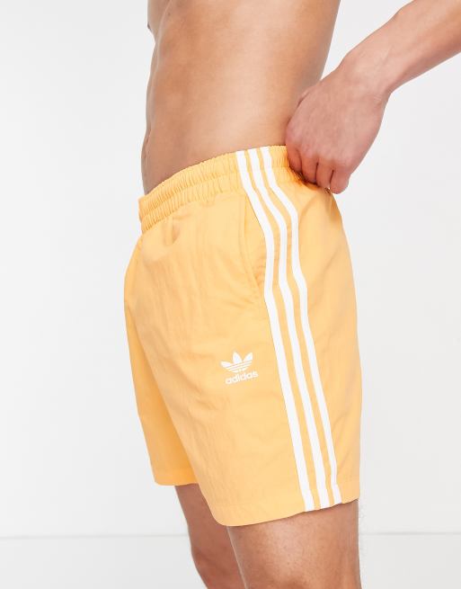 adidas Originals - adicolor - Short met 3-Stripes in oranje