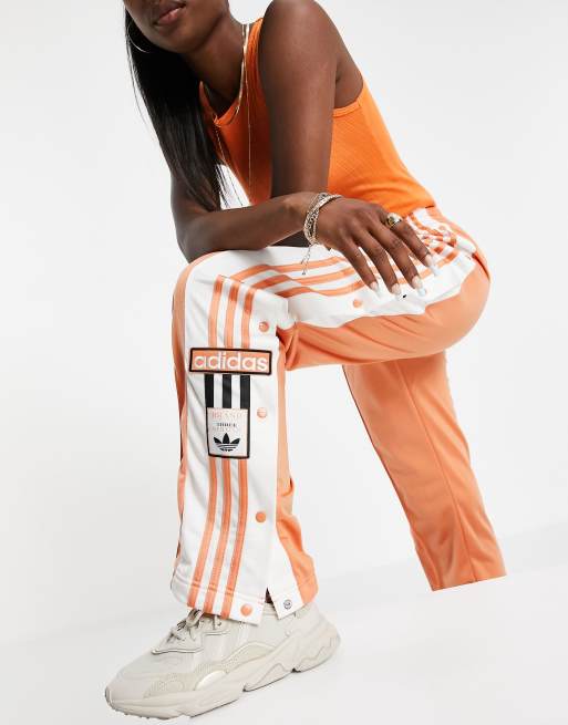 adidas Originals adicolor side logo track pants in hazy copper ASOS