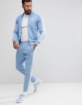 adidas Originals adicolor skinny Sweatpants cuffed hem In Blue CW1277 | ASOS