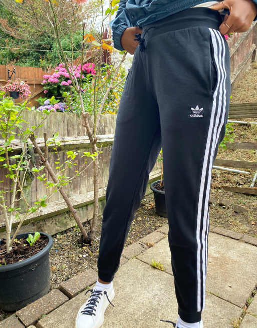Adidas brand with the 3 stripes pants on sale