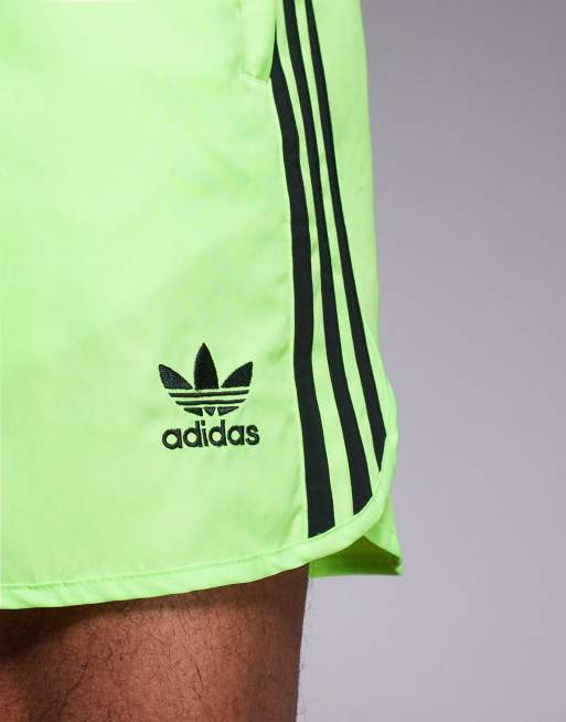 adidas Originals Adicolor sprinter shorts in lime, 4 of 5