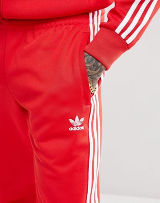 Red adidas Originals SST Cuffed Track Pants - JD Sports Global