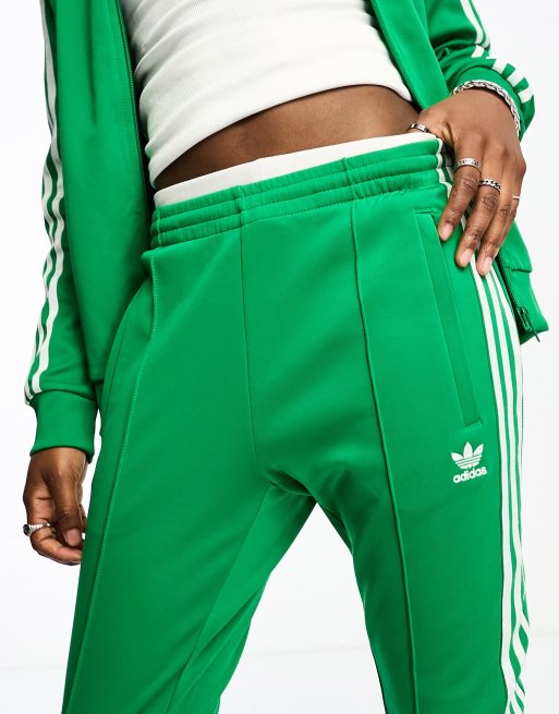 Grüne adidas jogginghose store