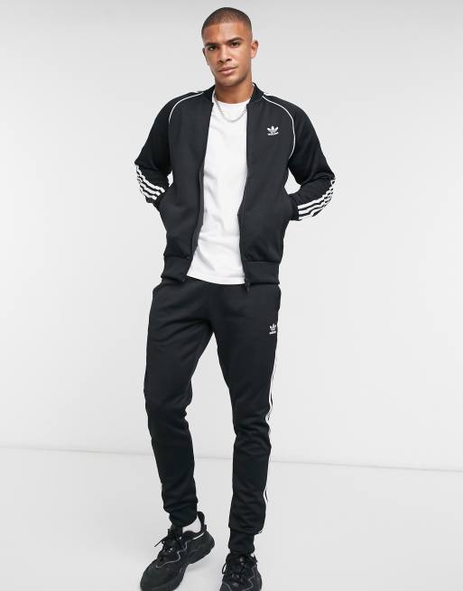 adidas adicolor three stripe skinny joggers in black - BLACK - ShopStyle  Trousers