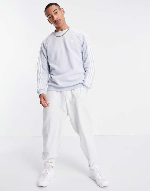 adidas Originals adicolor Sweat trois bandes Bleu clair ASOS