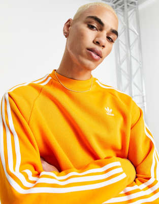 Adidas originals sweatshirt in black with orange piping discount