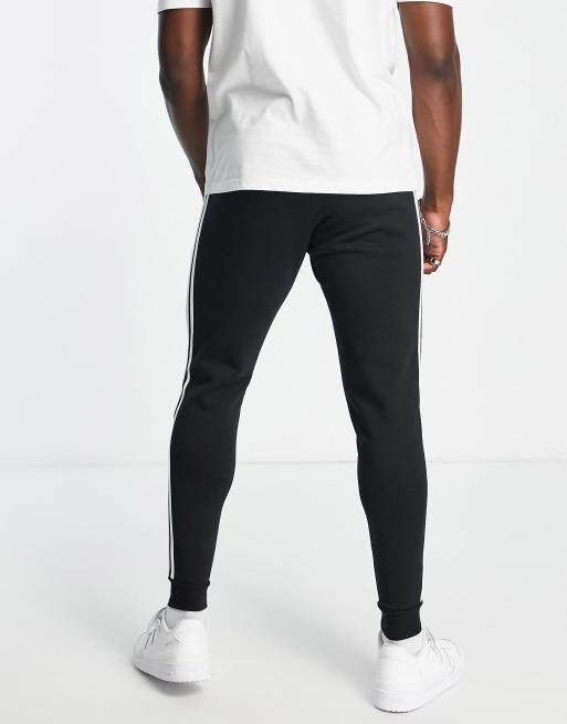 adidas Originals Adicolor Tall 3 stripe slim joggers in black ASOS