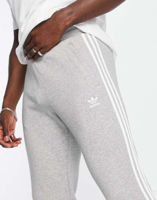 adidas Originals Adicolor Tall 3 stripe slim joggers in grey ASOS