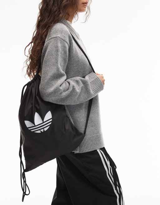adidas Originals – adicolor – Tasche mit Kordelzug in Schwarz, 1 von 4