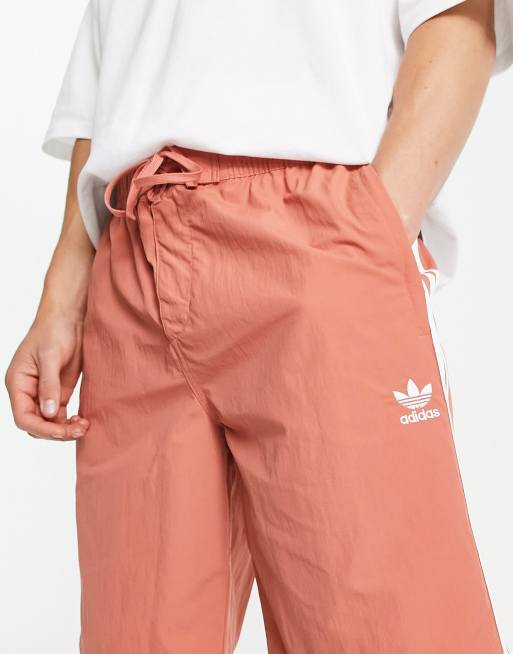 adidas Originals adicolor three stripe 10 inch shorts in beige