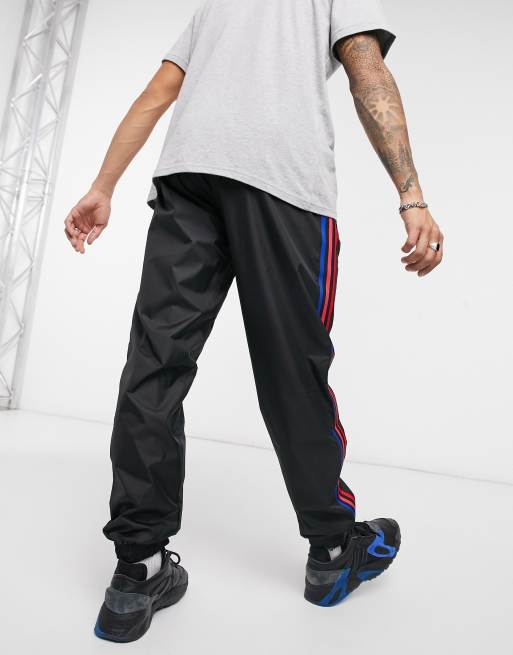 adidas Originals adicolor three stripe 3D trefoil sweatpants in black