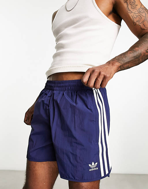 adidas Originals adicolor three inch sprinter shorts in navy |