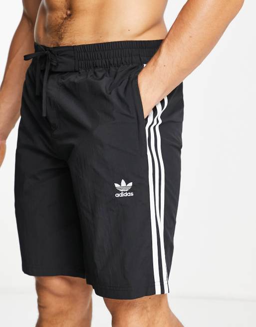 adidas Originals adicolor three stripe board shorts in black ASOS
