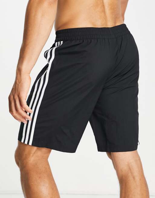 adidas Originals adicolor three | stripe shorts board in ASOS black