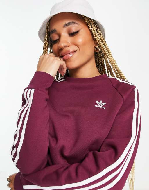 adidas Originals adicolor three stripe boyfriend fit long sleeve t-shirt in crimson |