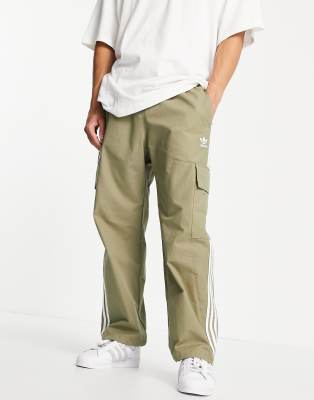 adidas Originals adicolor three stripe cargo pants in khaki with pocket detail-Green