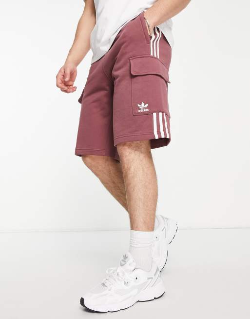 adidas Originals adicolor three stripe cargo shorts in quiet crimson | ASOS